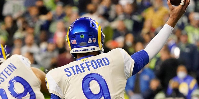 Los Angeles Rams quarterback Matthew Stafford (9) passes with duct tape on one of his fingers during the second half of an NFL football game against the Seattle Seahawks on Thursday, October 7 2021, in Seattle.