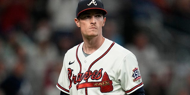 Atlanta Braves pitcher Max Fried walks to the dugout during the fourth inning in Game 1 of baseball's National League Championship Series against the Los Angeles Dodgers Saturday, Oct. 16, 2021, in Atlanta.