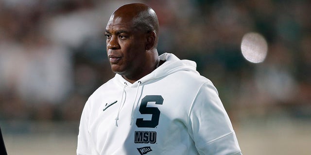 Michigan State coach Mel Tucker chats with officials during an NCAA football game Saturday, September 25, 2021 in East Lansing, Michigan. 