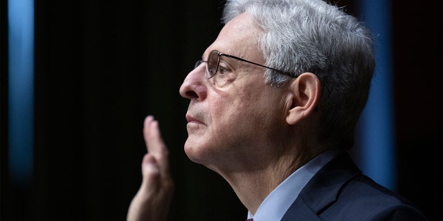 Attorney General Merrick Garland is sworn in during a Senate Judiciary Committee hearing examining the Department of Justice on Capitol Hill in Washington, Wednesday, Oct. 27, 2021. (Tom Brenner/Pool via AP)