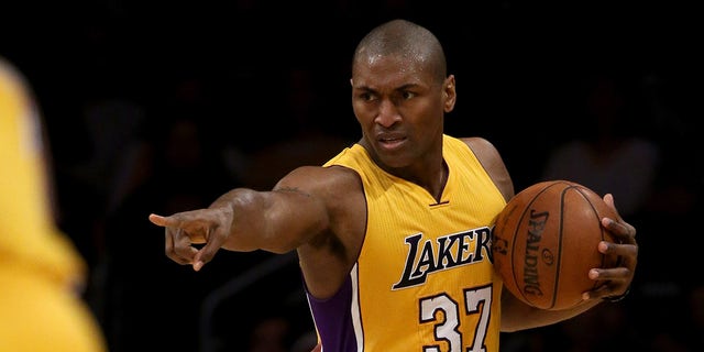 LOS ANGELES, CA - APRIL 06:  Metta World Peace #37 of the Los Angeles Lakers points to a teammate during the first half of an NBA game against the Los Angeles Clippers on April 6, 2016 at Staples Center in Los Angeles, California. 