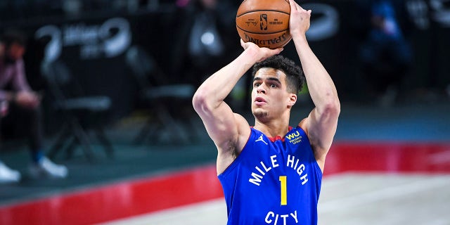Michael Porter Jr. #1 of the Denver Nuggets shoots a free throw against the Detroit Pistons during the first quarter of the NBA game at Little Caesars Arena on May 14, 2021 in Detroit, Michigan.