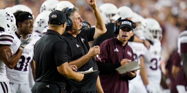 Mississippi State head coach Mike Leach calls plays to his offense on the field during the second half of an NCAA college football game on Saturday, Oct. 2, 2021, in College Station, Texas.
