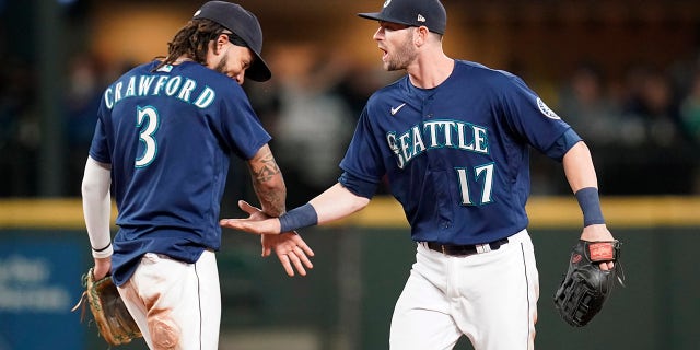 The team defeated Los Angeles Angeles in a baseball game in Seattle on Saturday after the Seattle Mariners shared congratulations to Mitch Hannigar (17) and JP Crawford (3). The Mariners won 6-4.