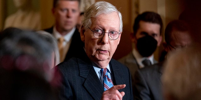Senate Minority Leader Mitch McConnell, R-Ky., speaks to reporters after a Republican strategy meeting at the Capitol in Washington, D.C., Tuesday, Oct. 19, 2021.