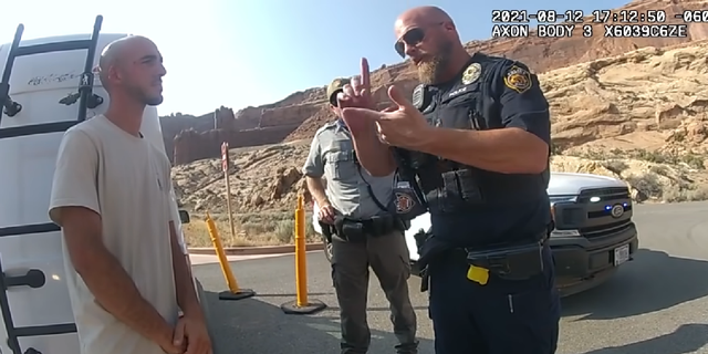 Moab Police Officer Eric Pratt, in bodycam footage released by investigators, is seen speaking to Brian Laundrie on Aug. 12. (Moab City Police Department)