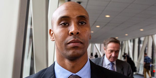 Former Minneapolis police officer Mohamed Noor leaves the Hennepin County Government Center in Minneapolis, Minnesota on April 2, 2019. - Jury selection began April 1, 2019, in the murder trial of a former Minnesota police officer who fatally shot an unarmed Australian woman, provoking outrage in the United States and in the victim's home country. Prosecutors say Somali-American Mohamed Noor opened fire on Justine Damond in Minneapolis in July 2017 while seated in the passenger seat of his squad car.