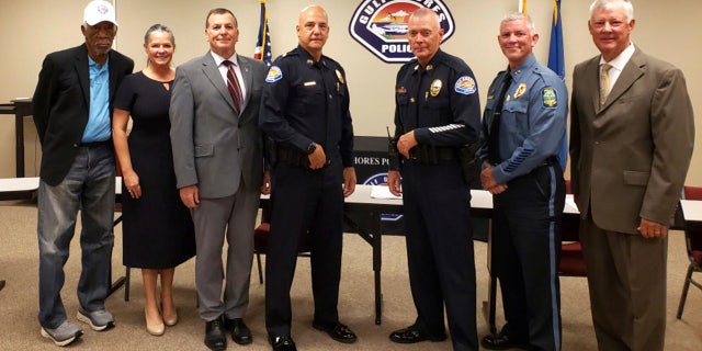 Morgan Freeman, sinistra, with six other members of a panel that interviewed police recruits in Gulf Shores, Ala., di venerdì, Ott. 15, 2021. Officials said Freeman, who owns property in the city and spends time there, volunteered to help out with the screening process.