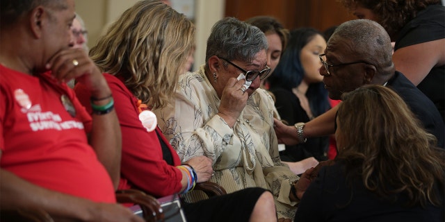 The Rev. Sharon Risher, who had lost mother Ethel Lance and cousins Tyzwana Sanders and Susie Jackson in the 2015 Emanuel African Methodist Episcopal Church shooting in Charleston, South Carolina, wipes tear during a gun control forum Sept. 10, 2019 on Capitol Hill in Washington, D.C. (Photo by Alex Wong/Getty Images)