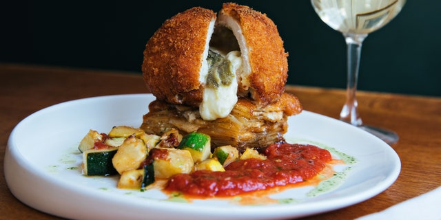 Cru Cafe’s Mozzarella and Poblano Fried Chicken is loosely based off Chicken Cordon Bleu, but with a Southern twist, Executive Chef John Zucker tells Fox News.
