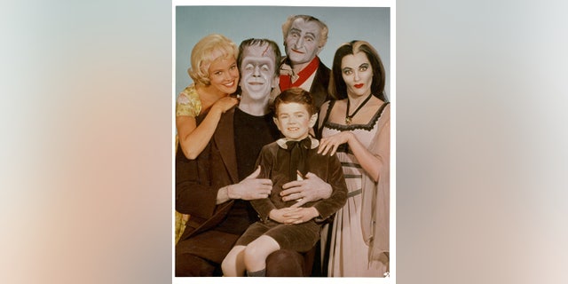 Original ‘Musters’ stars (from left to right): Pat Priest, Fred Gwynne, Al Lewis, Butch Patrick and Yvonne De Carlo. The show ran from 1964-1966.