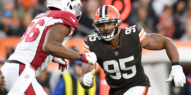 Myles Garrett of the Cleveland Browns rushes at Demetrius Harris of the Arizona Cardinals during the fourth quarter at FirstEnergy Stadium on Oct. 17, 2021, in Cleveland, Ohio.