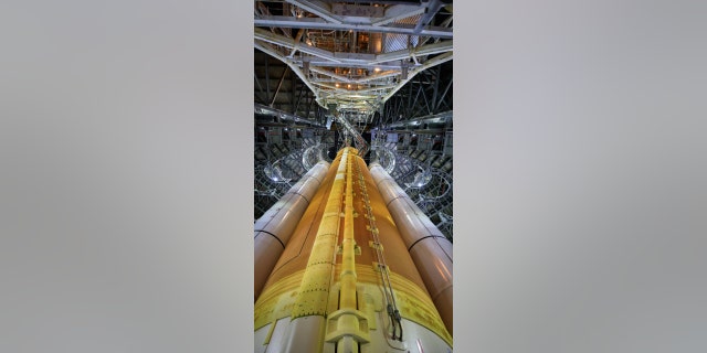 This close-up view shows the SLS rocket for Artemis I inside High Bay 3 of the Vehicle Assembly Building (VAB) at NASA’s Kennedy Space Center in Florida on Sept. 20, 2021. Inside the VAB, the rocket recently completed the umbilical retract and release test and the integrated modal test.