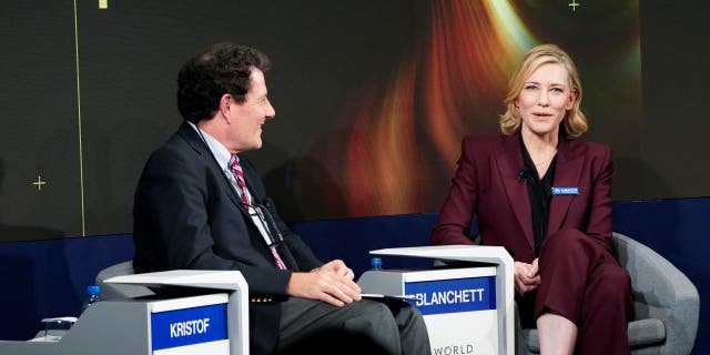 Cate Blanchett, Goodwill Ambassador, United Nations High Commissioner for Refugees (UNHCR), and Nicholas D. Kristof, Columnist at New York Times, speak during the World Economic Forum (WEF) annual meeting in Davos, Switzerland January 23, 2018.