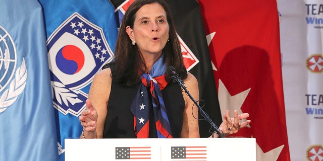 In this Aug. 1, 2017, file photo, then-U.S. Olympic Committee chief marketing officer Lisa Baird speaks about the Team USA WinterFest for the upcoming 2018 Pyeongchang Winter Olympic Games, at Yongsan Garrison, a U.S. military base in Seoul, South Korea. National Women's Soccer League Commissioner Lisa Baird is out after some 19 months on the job amid allegations that a former coach engaged in sexual harassment and misconduct toward players, a person with knowledge of the situation told The Associated Press. The person spoke to the AP on the condition of anonymity because the move Friday, Oct. 1, 2021 had not been made public.(AP Photo/Lee Jin-man, File)