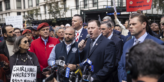 Uniformed Firefighters Association (UFA) President Andrew Ansbro speaks during a protest outside the Gracie Mansion Conservancy against the coming COVID-19 vaccine mandate for city workers.