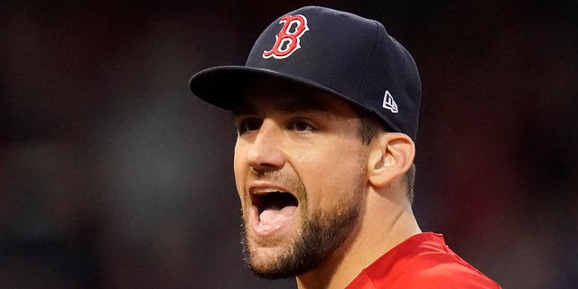 Boston Red Sox pitcher Nathan Eovaldi reacts in the bottom of the fifth inning against the Tampa Bay Rays during Game 3 of an American League Division Series on October 10, 2021 in Boston.