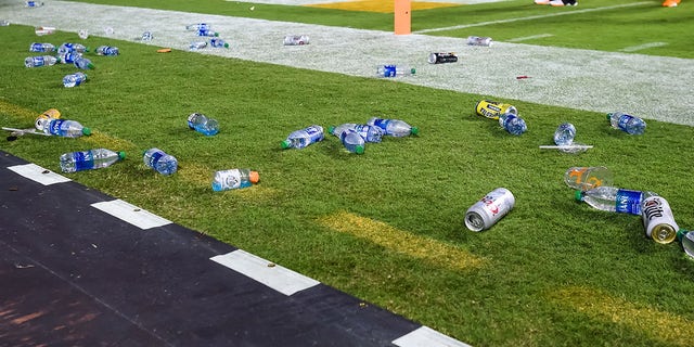 Oct 16, 2021; Knoxville, Tennessee, USA; Debris is seen on the field after fans threw objects onto the field during the second half of a game between the Tennessee Volunteers and Mississippi Rebels at Neyland Stadium.