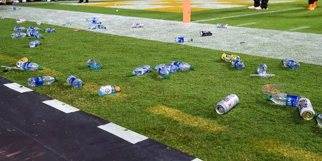 Oct 16, 2021; Knoxville, Tennessee, USA; Debris is seen on the field after fans threw objects onto the field during the second half of a game between the Tennessee Volunteers and Mississippi Rebels at Neyland Stadium.