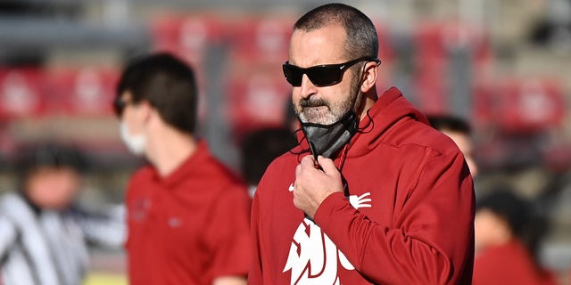 Oct 16, 2021; Pullman, Washington, USA; Washington State Cougars head coach Nick Rolovich looks on during warms before a game against the Stanford Cardinal at Gesa Field at Martin Stadium.