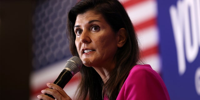 Nikki Haley, the former Governor of South Carolina and Ambassador to the UN, stumps for Virginia gubernatorial candidate Glenn Youngkin (R-VA), during a campaign event in McLean, Virginia, July 14, 2021. REUTERS/Evelyn Hockstein