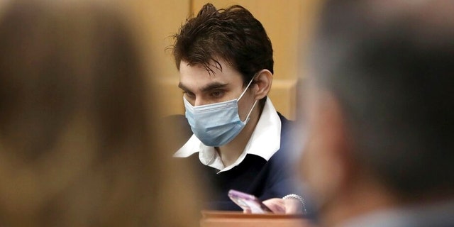 Parkland school shooter Nikolas Cruz is shown at the defense table at the Broward County Courthouse in Fort Lauderdale, Fla., on Monday, Oct. 4, 2021. 