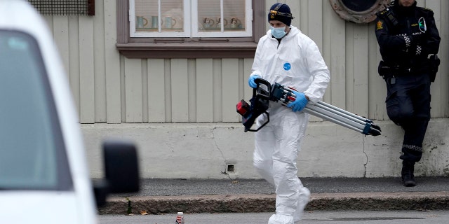 Police work near a site Thursday after a man killed some people in Kongsberg, Norway.