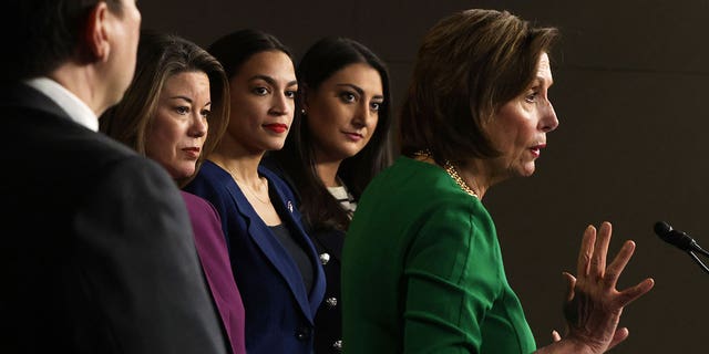 House Speaker Nancy Pelosi, D-Calif., right, addresses reporters in Washington, June 16, 2021. Behind her, from left, are Democratic U.S. Reps. Gwen Moore of Wisconsin; Angie Craig of Minnesota; Alexandria Ocasio-Cortez of New York and Sara Jacobs of California.
