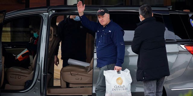 Peter Daszak, a member of the World Health Organization (WHO) team tasked with investigating the origins of the coronavirus disease (COVID-19), waves as he leaves a hotel in Wuhan, Hubei province, China February 10, 2021.