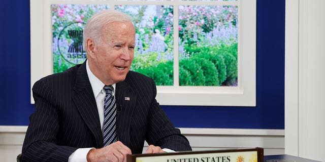 U.S. President Joe Biden participates virtually with the ASEAN summit from an auditorium at the White House in Washington, U.S. October 26, 2021.