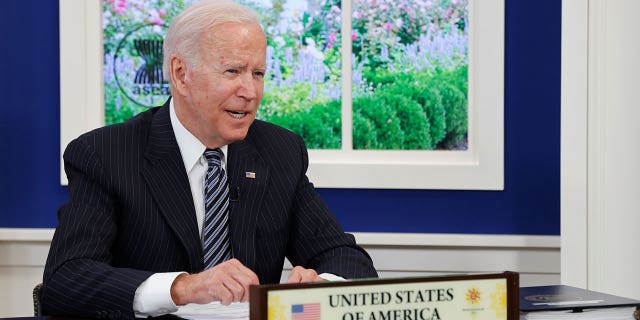 U.S. President Joe Biden participates virtually with the ASEAN summit from an auditorium at the White House in Washington, U.S. October 26, 2021.