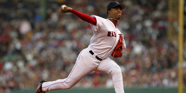 Boston Red Sox starting pitcher Pedro Martinez delivers while the New York Yankees defeated the Boston Red Sox 4-3 during Game 3 of the 2003 American League Championship Series on October 11, 2003 at Fenway Park in Boston, Massachusetts.