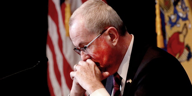 New Jersey Gov. Phil Murphy pauses during his COVID-19 update at the War Memorial in Trenton Feb. 5, 2021.