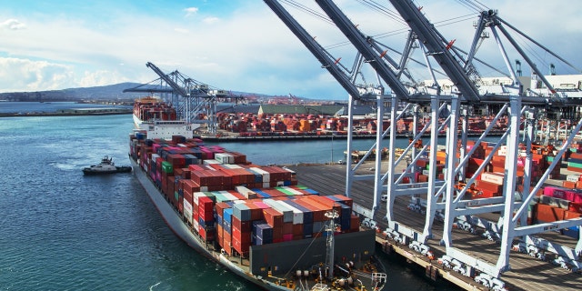 A container ship arrives in the Port of Long Beach, California.