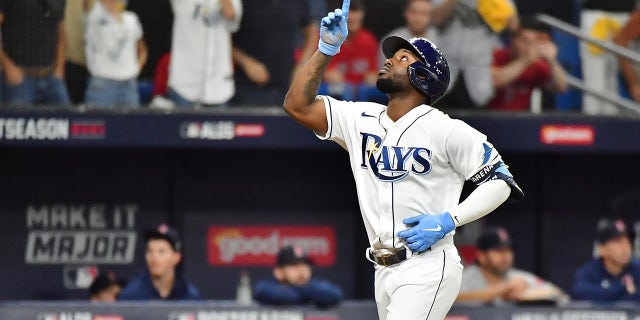 Randy Arozarena #56 of the Tampa Bay Rays celebrates his solo home run in the fifth inning against the Boston Red Sox during Game 1 of the American League Division Series at Tropicana Field on October 07, 2021 in St Petersburg, Florida.