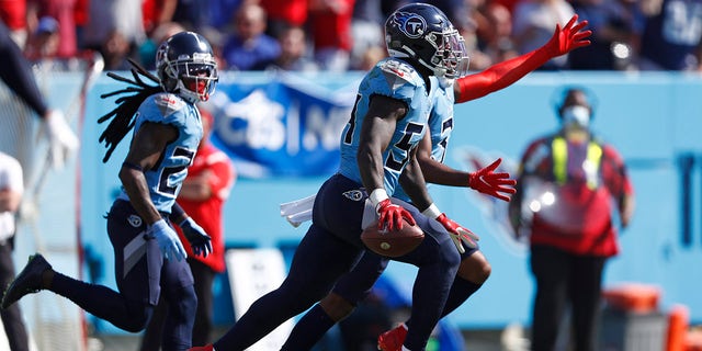 Tennessee Titans inside linebacker Rashaan Evans (54) celebrates after intercepting a pass against the Kansas City Chiefs in the first half of an NFL football game Sunday, Oct. 24, 2021, in Nashville, Tenn.