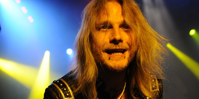 Judas Priest guitarist Richie Faulkner suffered a ‘aortic aneurysm and complete aortic dissection’ while on stage in Kentucky.