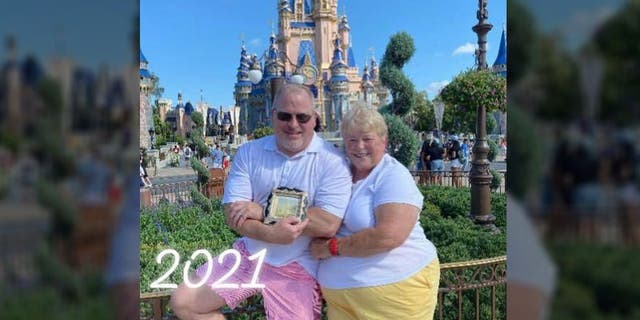 Susan Gaul Kroll and her now adult son recreated their Magic Kingdom photo on Saturday, Oct. 2, one day after Walt Disney World Resort kicked off its 50th Anniversary Celebration.
