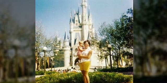 Susan Gaul Kroll took her son Bill to Magic Kingdom on its opening day – Oct. 1, 1971. Here the pair appear before Cinderella Castle.