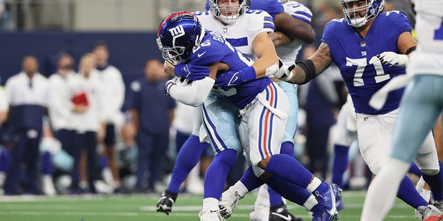 New York Giants running back Saquon Barkley (26) runs with the ball against the Dallas Cowboys.