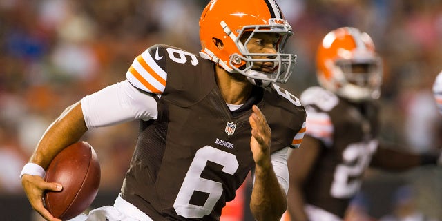 Quarterback Seneca Wallace #6 of the Cleveland Browns scrambles for a gain during the first half of a preseason game against the Chicago Bears at the Browns' stadium on Aug. 30, 2012, in Cleveland, Ohio.