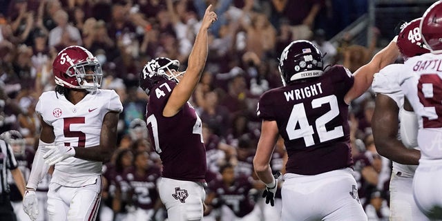 Texas A&M's Seth Small (47) reacts after scoring a goal to defeat Alabama at the end of an NCAA college football game on Saturday October 9, 2021 in College Station, Texas.