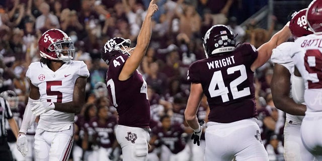 Texas A&M's Seth Small (47) reacts after scoring a goal to defeat Alabama at the end of an NCAA college football game on Saturday October 9, 2021 in College Station, Texas.