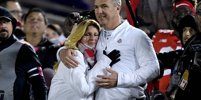 Ohio State Buckeyes Head Coach Urban Meyer and his wife Shelley Meyer watch sideways as time runs out in the Rose Bowl Game presented by Northwestern Mutual at the Rose Bowl on January 1, 2019 in Pasadena, California.