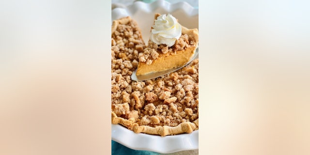 The "Snickerdoodle Pumpkin Pie" recipe combines pumpkin pie topped with a snickerdoodle cookie crumble. (Courtesy of Quiche My Grits)