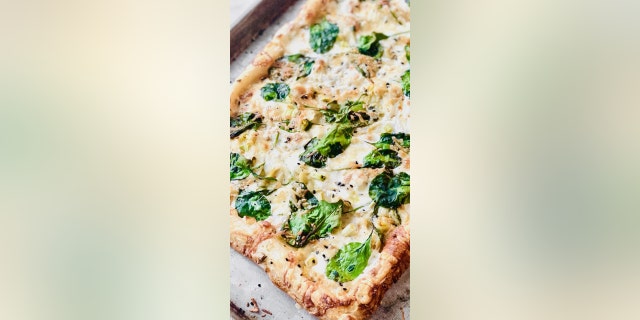 "Spinach Alfredo Pizza," from Southern food blog Quiche My Grits, uses puff pastry as the base. (Courtesy of Quiche My Grits)