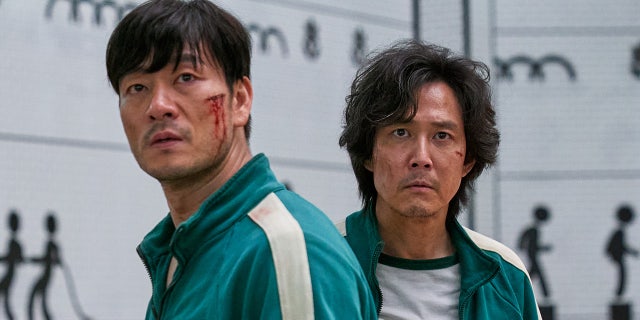 "Squid Game" -- Netflix’s "biggest series launch ever" -- tells the story of 456 people who have dire financial troubles and participate in a series of children’s games such as "Red Light, Green Light" in the hopes of winning a massive cash prize. However, the penalty for losing is a brutal death. (Netflix)