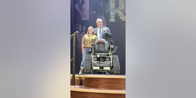 U.S. Army Sgt. Stephanie Vazquez being gifted her own customized all-terrain wheelchair from Freedom Alliance. 