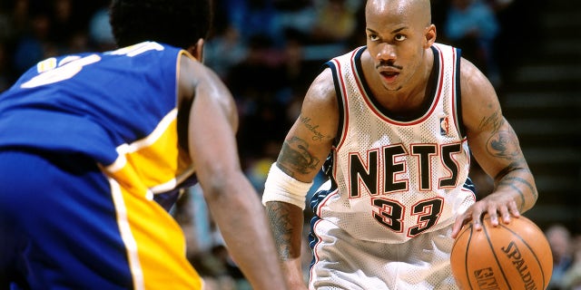 Stephon Marbury #33 of the New Jersey Nets dribbles against the Los Angeles Lakers on February 13, 2001 at Continental Airlines Arena in East Rutherford, New Jersey.