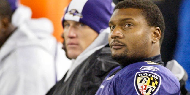 Baltimore Ravens quarterback Steve McNair sits on the bench after being taken out of play in the fourth quarter of their NFL football game against the Cincinnati Bengals in Baltimore, Maryland on November 11, 2007. The winger close to the Ravens Todd Heap sits to McNair's left.